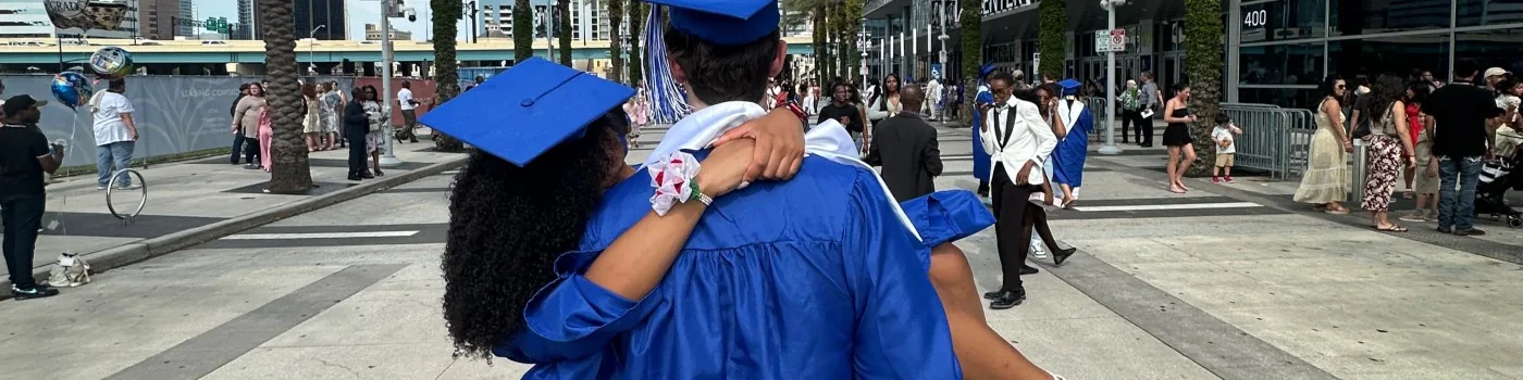 Graduates celebrating together after commencement