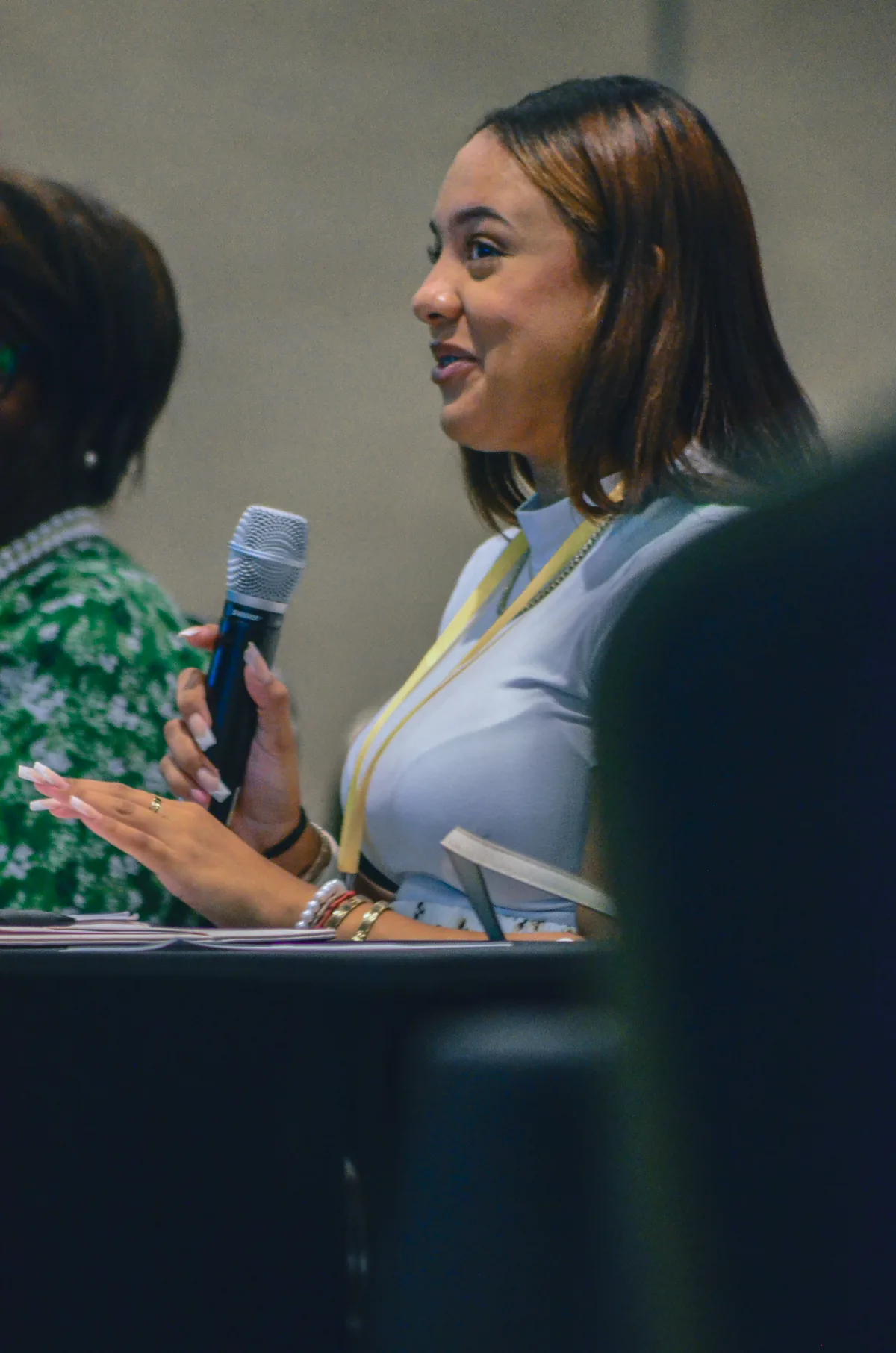 Business professional speaking during a Bright Minds program